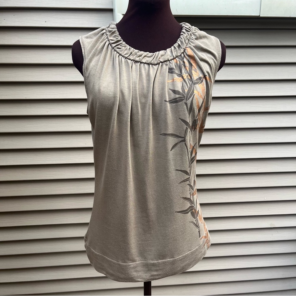 Sleeveless tan blouse with bamboo print